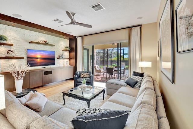 9380 Isles Cay Dr, Delray Beach, FL 33446 - living room featuring a ceiling fan and wood finished floors
