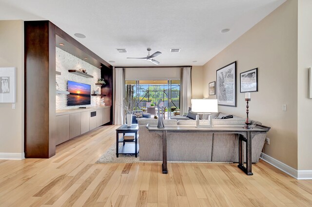 9380 Isles Cay Dr, Delray Beach, FL 33446 - home office with wood finished floors, a ceiling fan, and baseboards