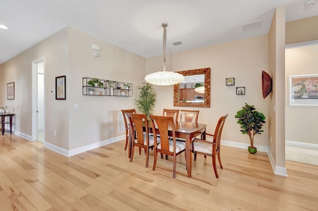 9380 Isles Cay Dr, Delray Beach, FL 33446 - dining area featuring light wood-style flooring, baseboards, a chandelier, and recessed lighting