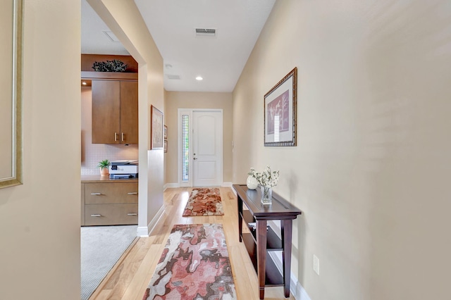 9380 Isles Cay Dr, Delray Beach, FL 33446 - corridor featuring light wood finished floors, baseboards, and recessed lighting
