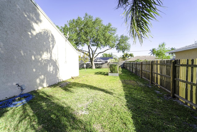 view of yard featuring a fenced backyard