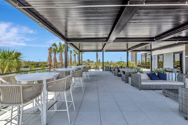 view of patio featuring an outdoor hangout area and outdoor dining space