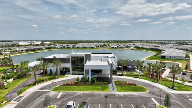 bird's eye view featuring a residential view and a water view