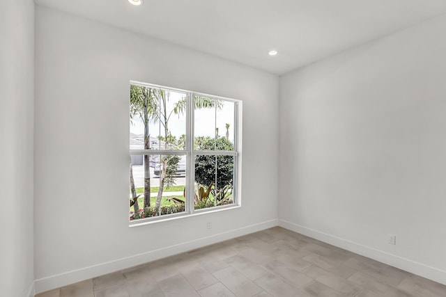 10130 Driftwood Way, Palm Beach Gardens, FL 33412 - spare room featuring baseboards and recessed lighting