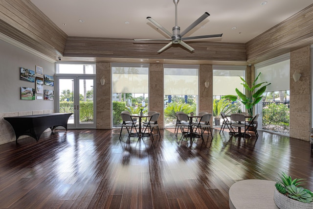 interior space with french doors, ceiling fan, wood finished floors, and ornamental molding