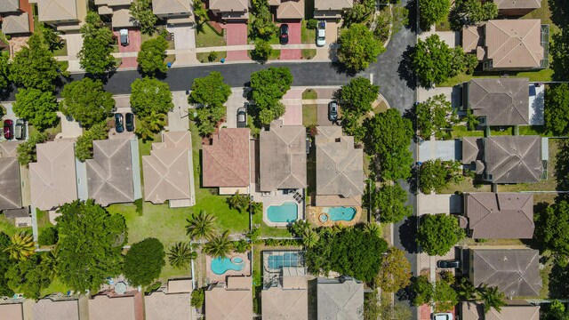 aerial perspective of suburban area with a pool