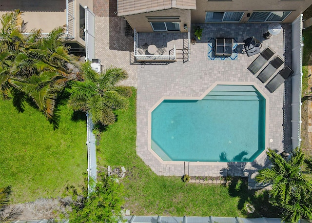 view from above of property with a pool area