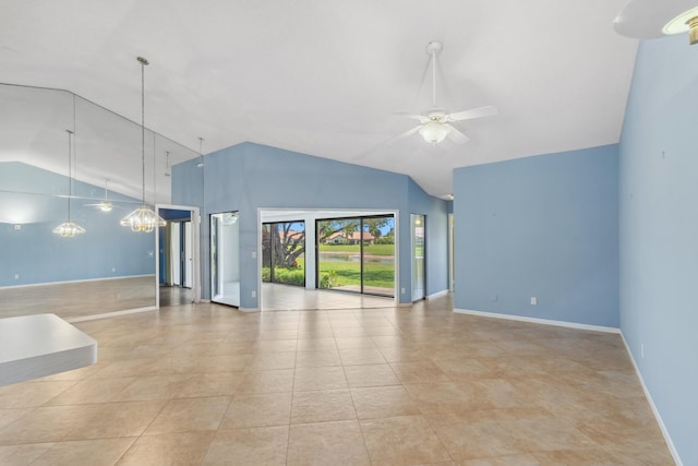 5942 Parkwalk Cir W, Boynton Beach, FL 33472 - unfurnished living room with lofted ceiling, baseboards, tile patterned flooring, and ceiling fan with notable chandelier