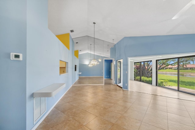 5942 Parkwalk Cir W, Boynton Beach, FL 33472 - interior space with tile patterned flooring, a water view, baseboards, high vaulted ceiling, and a notable chandelier