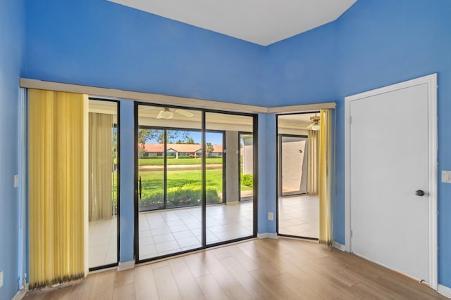 5942 Parkwalk Cir W, Boynton Beach, FL 33472 - interior space with baseboards, a ceiling fan, and wood finished floors