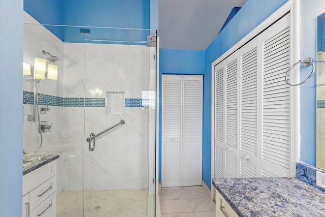 5942 Parkwalk Cir W, Boynton Beach, FL 33472 - bathroom with marble finish floor, a closet, vanity, and a stall shower