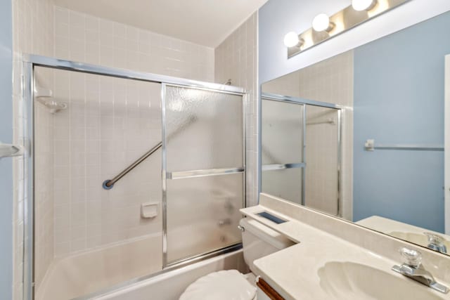 5942 Parkwalk Cir W, Boynton Beach, FL 33472 - full bath featuring vanity, toilet, and bath / shower combo with glass door