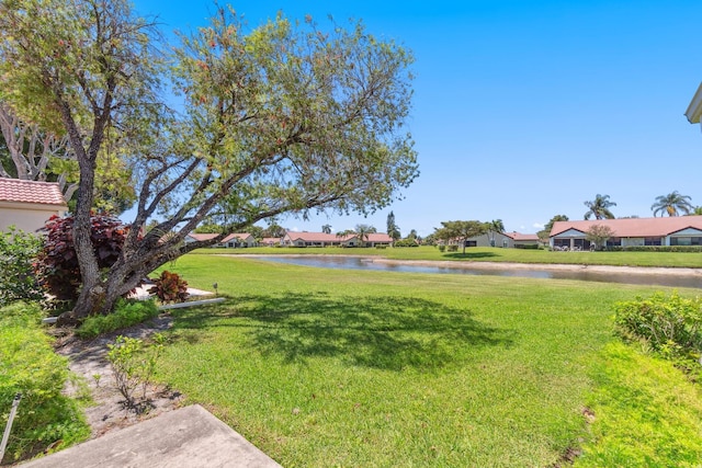 5942 Parkwalk Cir W, Boynton Beach, FL 33472 - view of yard featuring a residential view and a water view