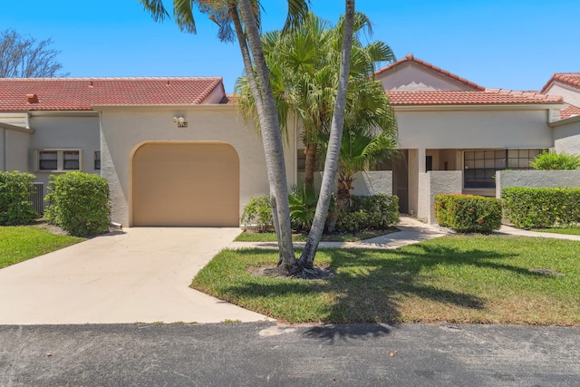 5942 Parkwalk Cir W, Boynton Beach, FL 33472 - view of front of home featuring stucco siding, an attached garage, and a tiled roof