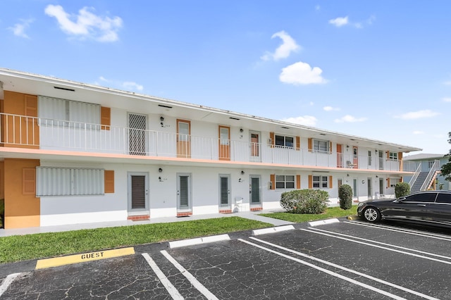 1116 Lake Ter Unit 203, Boynton Beach, FL 33426 - view of property featuring uncovered parking