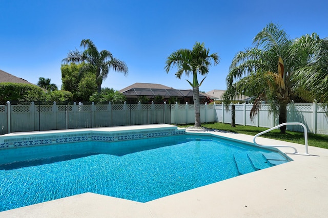 view of pool with fence