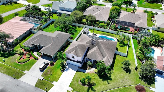 aerial perspective of suburban area with a pool