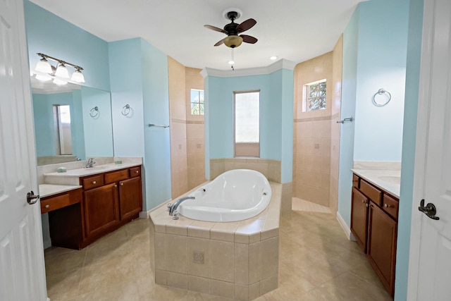 bathroom featuring a garden tub, ceiling fan, tile patterned floors, and two vanities
