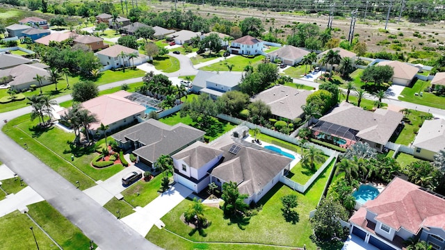 aerial view of residential area with a pool area