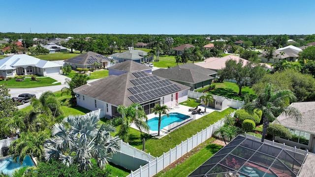 aerial perspective of suburban area with a pool