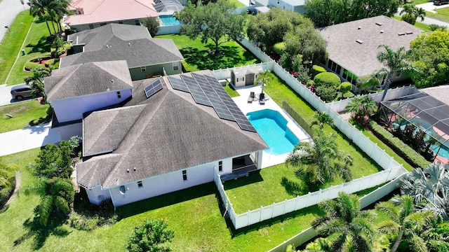aerial view of residential area with a pool area