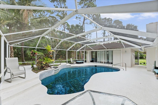 pool featuring a lanai and a patio