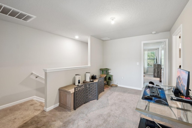 5684 Mentmore Dr, Mangonia Park, FL 33407 - carpeted office featuring a textured ceiling, baseboards, and visible vents