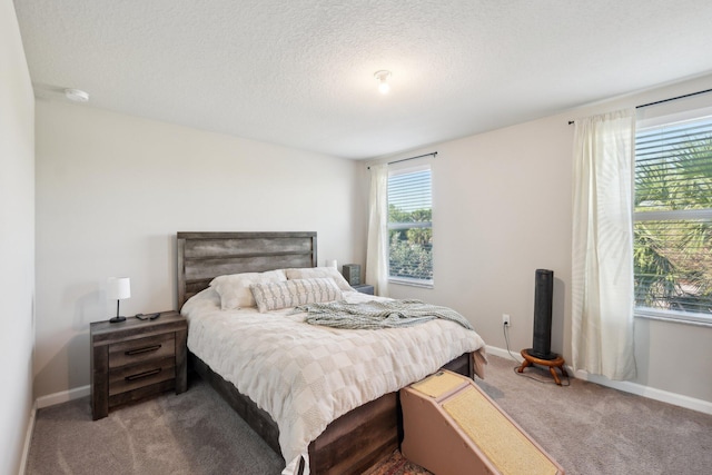 5684 Mentmore Dr, Mangonia Park, FL 33407 - carpeted bedroom with a textured ceiling and baseboards