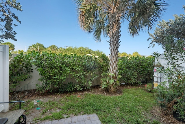 5684 Mentmore Dr, Mangonia Park, FL 33407 - view of yard featuring a fenced backyard
