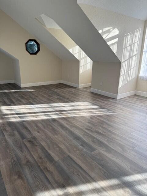 795 SW All American Blvd, Palm City, FL 34990 - additional living space featuring wood finished floors, baseboards, and vaulted ceiling