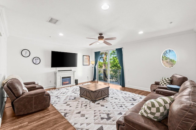 1874 Via Sofia, Boynton Beach, FL 33426 - living room with crown molding, a ceiling fan, and baseboards