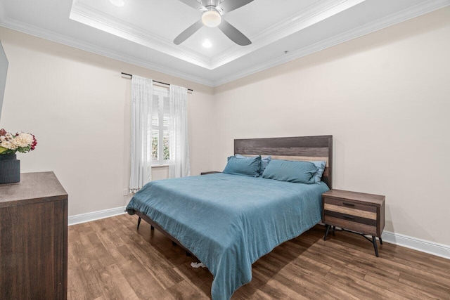 1874 Via Sofia, Boynton Beach, FL 33426 - bedroom with crown molding, a tray ceiling, baseboards, and wood finished floors