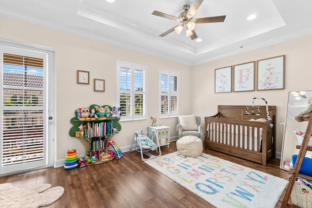 1874 Via Sofia, Boynton Beach, FL 33426 - bedroom featuring crown molding, a tray ceiling, recessed lighting, and wood finished floors