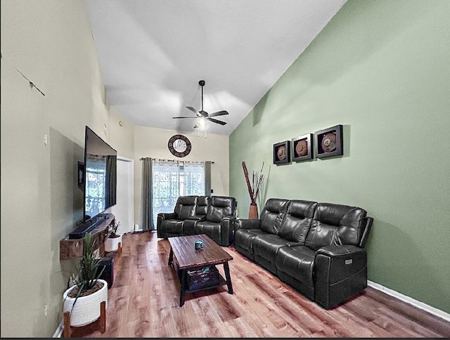 3696 Timberline Dr, West Palm Beach, FL 33406 - living area featuring wood finished floors, high vaulted ceiling, baseboards, and a ceiling fan