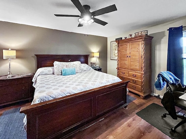 3696 Timberline Dr, West Palm Beach, FL 33406 - bedroom with a ceiling fan and dark wood finished floors