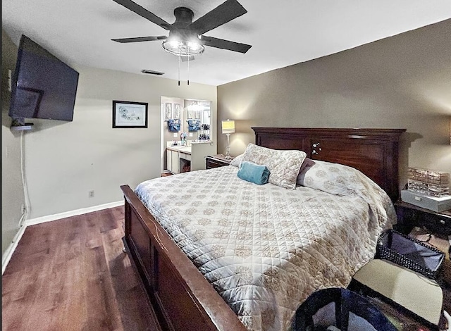 3696 Timberline Dr, West Palm Beach, FL 33406 - bedroom featuring dark wood-style floors, baseboards, visible vents, and ceiling fan