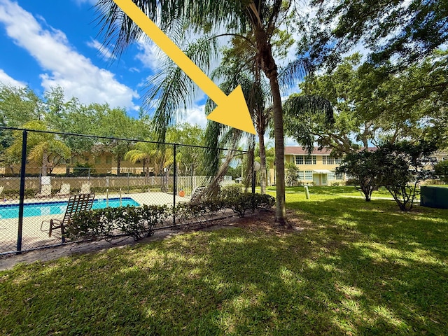 208 Palm Beach Trace Dr, Royal Palm Beach, FL 33411 - view of yard featuring a community pool