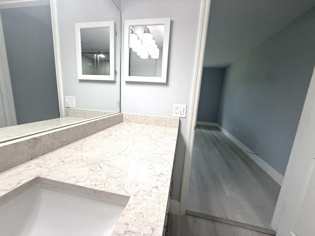 208 Palm Beach Trace Dr, Royal Palm Beach, FL 33411 - bathroom featuring ceiling fan, vanity, baseboards, and wood finished floors