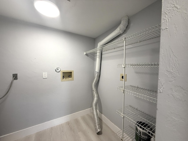 208 Palm Beach Trace Dr, Royal Palm Beach, FL 33411 - laundry room with electric dryer hookup, hookup for a washing machine, wood finished floors, and baseboards