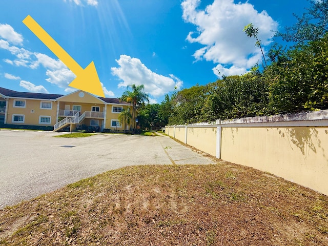 208 Palm Beach Trace Dr, Royal Palm Beach, FL 33411 - view of asphalt road with stairway