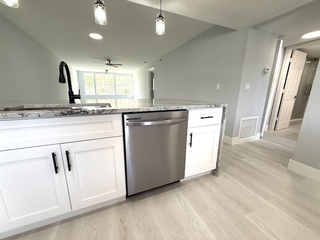 208 Palm Beach Trace Dr, Royal Palm Beach, FL 33411 - kitchen featuring dishwasher, a sink, baseboards, light wood-style floors, and white cabinets