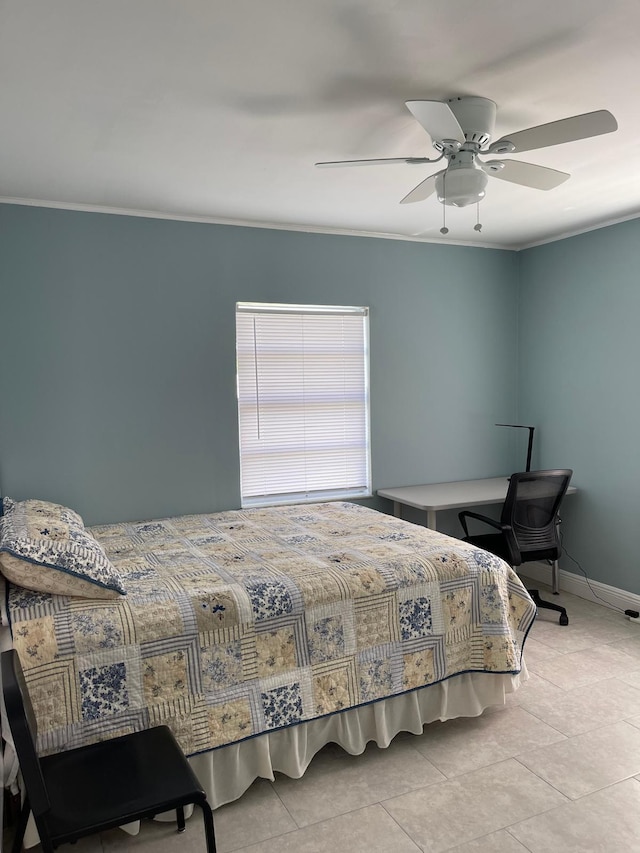 bedroom with ornamental molding, ceiling fan, tile patterned floors, and baseboards