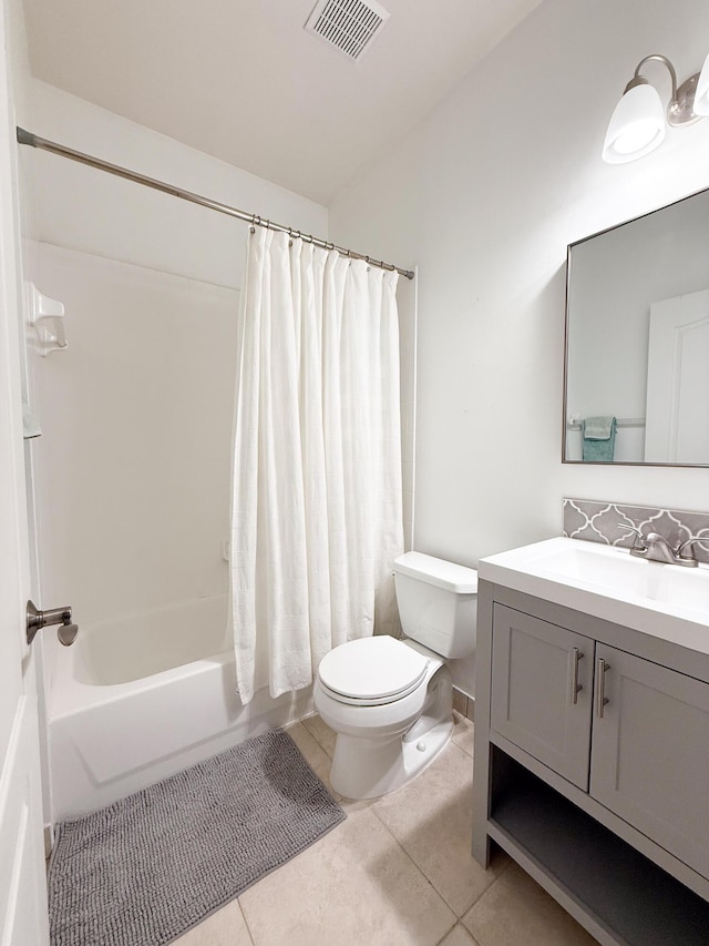 4803 NW 59th Ct, Coconut Creek, FL 33073 - full bathroom with shower / tub combo, vanity, tile patterned floors, toilet, and visible vents