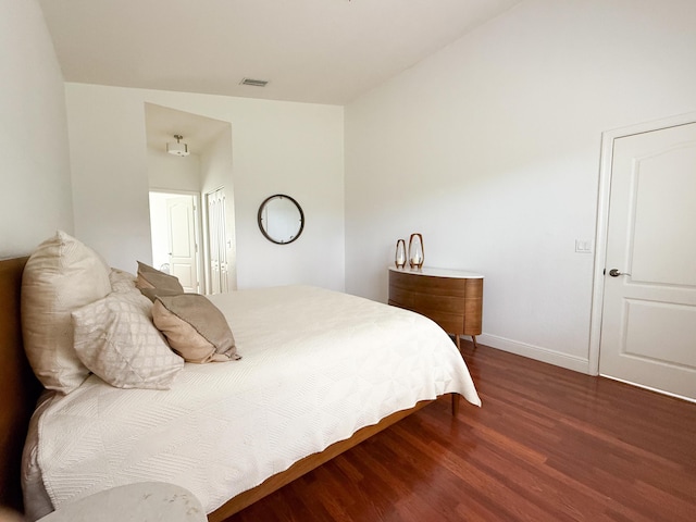 4803 NW 59th Ct, Coconut Creek, FL 33073 - bedroom with baseboards and wood finished floors
