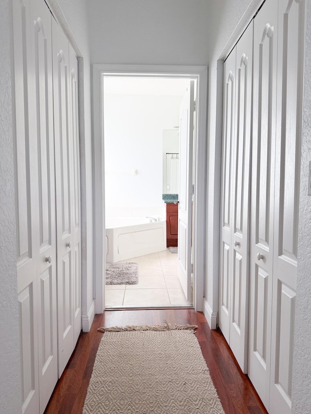 4803 NW 59th Ct, Coconut Creek, FL 33073 - hallway with wood finished floors