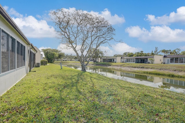 view of yard with a water view