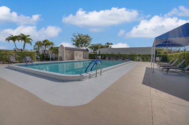 pool with a patio