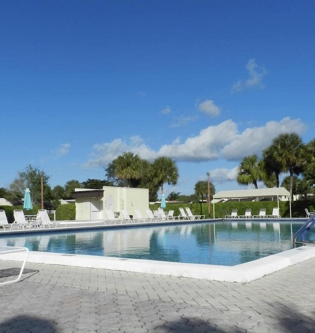 community pool featuring a patio area
