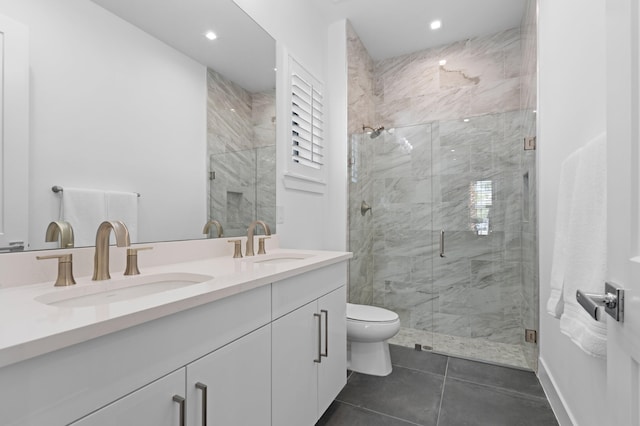 3038 Safflower Cir, West Palm Beach, FL 33401 - bathroom with double vanity, a marble finish shower, toilet, recessed lighting, and tile patterned flooring