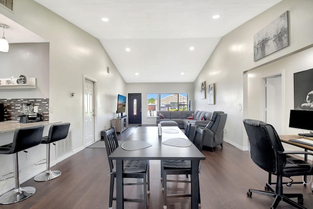 7938 Ridgewood Dr, Lake Worth, FL 33467 - home office with dark wood-type flooring, visible vents, baseboards, and high vaulted ceiling